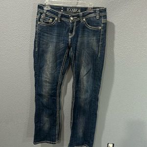 Rock and Roll cowgirl riding jeans